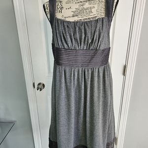 Decode dress features jersey like material, silk pleating, and pockets NWOT